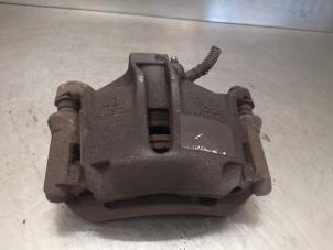Used Front brake calliper, left Peugeot 206+ (2L/M) 1.1 XR,XS Price on request offered by Bongers Auto-Onderdelen Zeeland