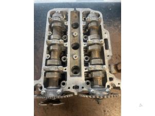 Used Cylinder head Opel Corsa D 1.0 Price on request offered by Bongers Auto-Onderdelen Zeeland