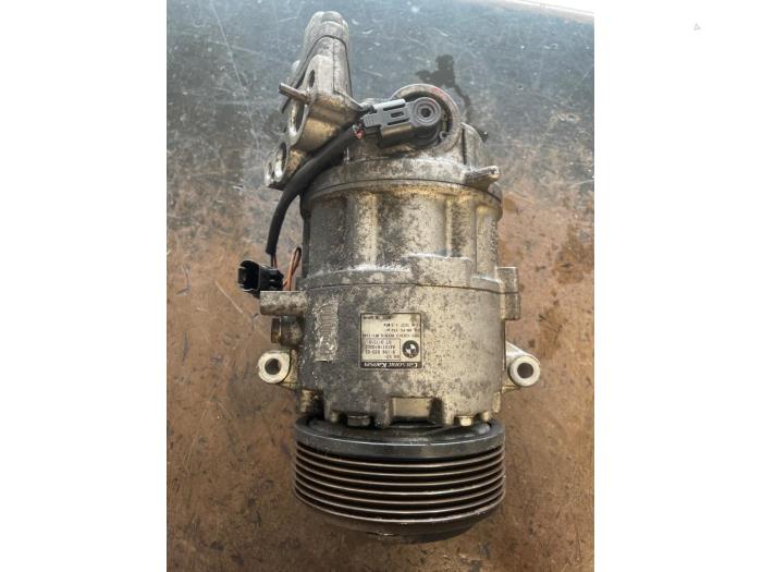 Air conditioning pump from a BMW 1 serie (E81) 116i 1.6 16V 2008