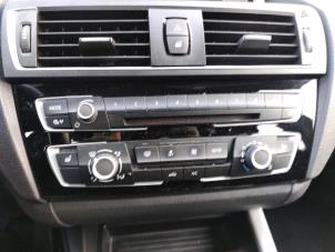 Usados Panel de control de calefacción BMW 1 serie (F20) 116i 1.5 12V Precio de solicitud ofrecido por Bongers Auto-Onderdelen Zeeland