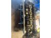 Cylinder head from a Opel Astra H (L48) 1.6 16V Twinport 2005