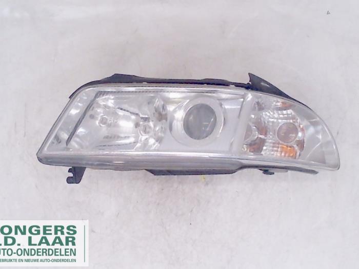 Headlight, left from a Audi A4 2000