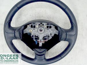 Used Steering wheel Peugeot 206+ (2L/M) 1.4 XS Price on request offered by Bongers Auto-Onderdelen Zeeland