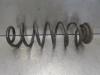 Rear coil spring from a Skoda Octavia Combi (1Z5) 1.6 TDI Greenline 2011