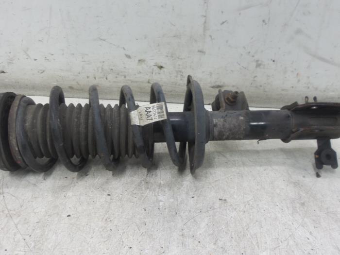 Front shock absorber rod, left from a Daewoo Spark 1.2 16V 2011