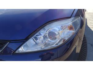 Używane Reflektor lewy Mazda 5. Cena na żądanie oferowane przez Bongers Auto-Onderdelen Zeeland