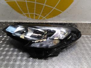 Used Headlight, left Opel Corsa E Price € 190,58 Inclusive VAT offered by Autodemontagebedrijf van Boxtel