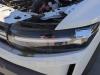 Strålkastare, vänster från en Dacia Duster (DJF) 1.0 Eco-G 12V 2024