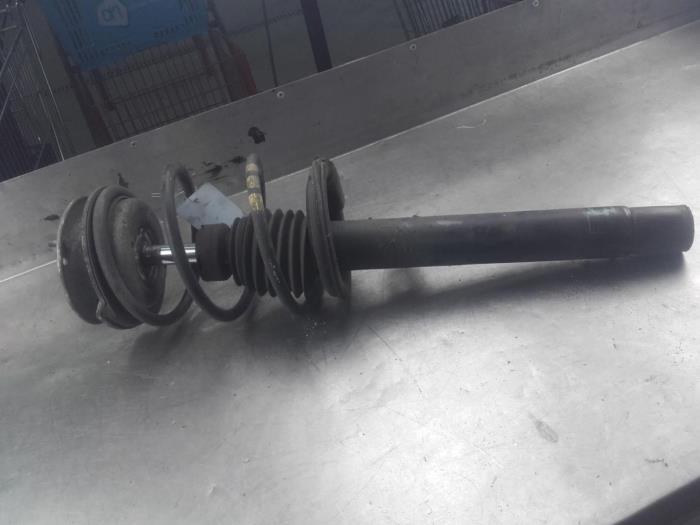 Front shock absorber rod, left from a BMW 3 serie Touring (E46/3) 318i 2000