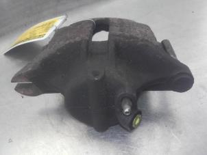 Used Front brake calliper, right Renault Kangoo (KC) 1.4 Price on request offered by Akkie Stomphorst Autodemontage
