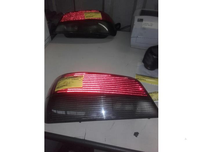 Taillight, left from a Peugeot 306 (7A/C/S) 1.4 2000