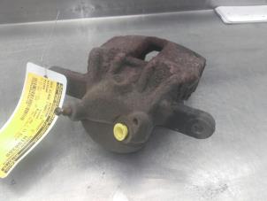 Used Front brake calliper, left Nissan Micra (K12) 1.2 16V Price on request offered by Akkie Stomphorst Autodemontage