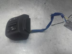 Used Steering wheel mounted radio control Nissan Micra (K12) 1.4 16V Price on request offered by Akkie Stomphorst Autodemontage