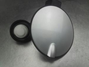 Used Tank cap cover Opel Corsa D 1.4 16V Twinport Price on request offered by Akkie Stomphorst Autodemontage