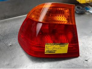 Used Taillight, left BMW 3 serie (E46/4) 320i 24V Price on request offered by Akkie Stomphorst Autodemontage