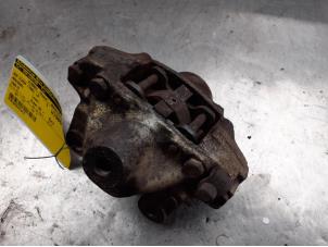 Used Rear brake calliper, left Mercedes 190 (W201) 1.8 E Price on request offered by Akkie Stomphorst Autodemontage