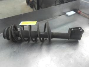 Used Front shock absorber rod, left Renault Clio (B/C57/357/557/577) 1.2i Kat. Price on request offered by Akkie Stomphorst Autodemontage