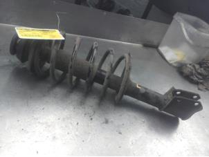 Used Front shock absorber rod, left Renault Clio (B/C57/357/557/577) 1.4 Kat. Price on request offered by Akkie Stomphorst Autodemontage