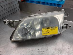 Used Headlight, left Mazda Premacy 1.8 16V Price on request offered by Akkie Stomphorst Autodemontage