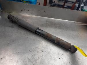 Used Rear shock absorber, left Renault Clio III (BR/CR) 1.5 dCi 85 Price on request offered by Akkie Stomphorst Autodemontage