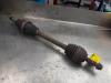 Front drive shaft, left from a Renault Clio III (BR/CR), 2005 / 2014 1.5 dCi 85, Hatchback, Diesel, 1.461cc, 63kW (86pk), FWD, K9K766; K9KT7, 2005-06 / 2012-12, BR1F; CR1F; BRCF; CRCF 2006