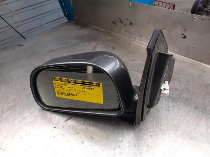 Wing mirror, left from a Mitsubishi Space Star (DG) 1.9 DI-D 2004