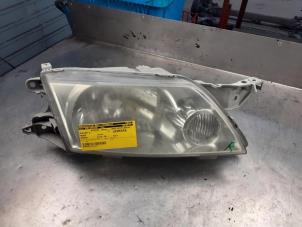 Używane Reflektor prawy Mazda Premacy 1.8 16V Cena na żądanie oferowane przez Akkie Stomphorst Autodemontage