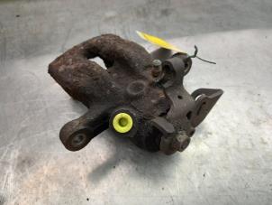 Used Rear brake calliper, left Renault Kangoo/Grand Kangoo (KW) 1.6 16V Price € 25,00 Margin scheme offered by Akkie Stomphorst Autodemontage