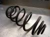 Rear coil spring from a Renault Kangoo/Grand Kangoo (KW), 2008 1.6 16V, MPV, Petrol, 1.598cc, 78kW (106pk), FWD, K4M830; K4MG8, 2008-02, KW0D; KW2D; KW4D 2008