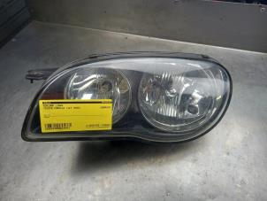 Used Headlight, left Toyota Corolla (EB/WZ/CD) 2.0 D-4D 16V Price € 35,00 Margin scheme offered by Akkie Stomphorst Autodemontage