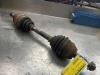 Front drive shaft, left from a Opel Zafira B 2007