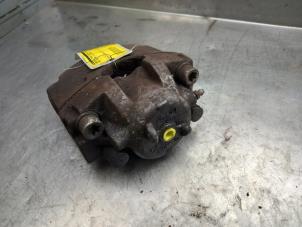 Used Front brake calliper, right Opel Vectra C 2.2 16V Price € 25,00 Margin scheme offered by Akkie Stomphorst Autodemontage