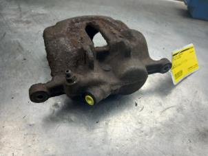 Used Front brake calliper, left Opel Vivaro 1.9 DI Price € 50,00 Margin scheme offered by Akkie Stomphorst Autodemontage