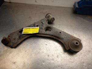 Used Front wishbone, left Opel Corsa D 1.4 16V Twinport Price € 25,00 Margin scheme offered by Akkie Stomphorst Autodemontage