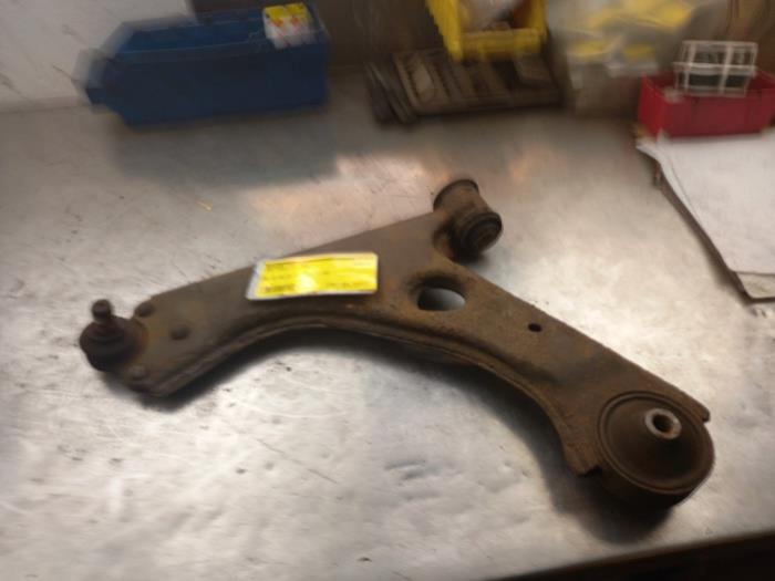 Front wishbone, left from a Opel Corsa D 1.4 16V Twinport 2007