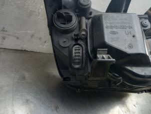 Used Headlight, left Ford Focus 2 Wagon 2.0 TDCi 16V Price € 25,00 Margin scheme offered by Akkie Stomphorst Autodemontage
