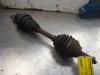 Front drive shaft, left from a Volvo V50 (MW), 2003 / 2012 2.4 20V, Combi/o, Petrol, 2.435cc, 103kW (140pk), FWD, B5244S5; EURO4, 2004-04 / 2010-12, MW66 2004
