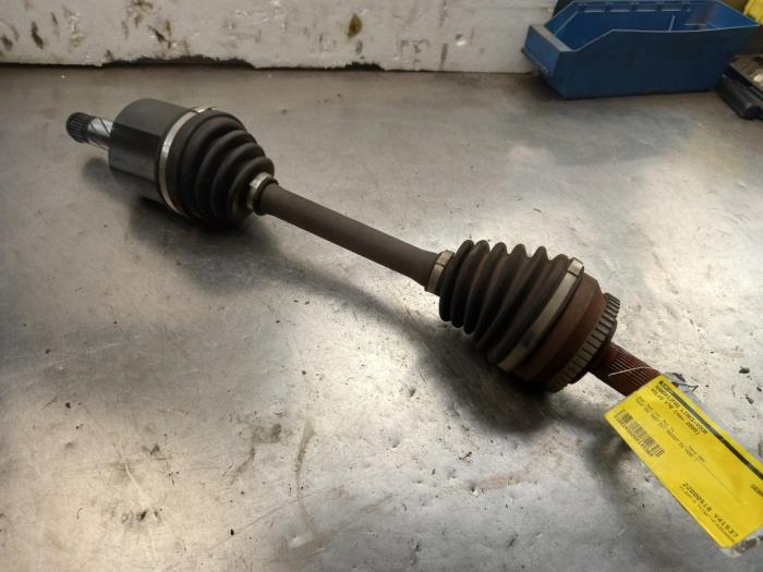 Front drive shaft, left from a Volvo V70 (SW) 2.4 D5 20V 2005