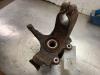 Knuckle, front left from a Ford Focus 2 Wagon 1.6 TDCi 16V 100 2008