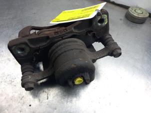 Used Front brake calliper, left Chevrolet Kalos (SF48) 1.4 16V Price € 35,00 Margin scheme offered by Akkie Stomphorst Autodemontage