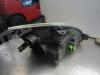Headlight, left from a Ford Fiesta 5 (JD/JH) 1.6 16V 2002