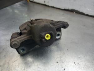 Used Front brake calliper, left Chevrolet Kalos (SF69) 1.4 Price € 25,00 Margin scheme offered by Akkie Stomphorst Autodemontage