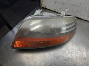 Used Headlight, left Chevrolet Kalos (SF48) 1.4 Price on request offered by Akkie Stomphorst Autodemontage