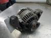 Dynamo d'un Daihatsu Cuore (L251/271/276), 2003 1.0 12V DVVT, Berline avec hayon arrière, Essence, 989cc, 43kW (58pk), FWD, EJVE, 2003-05 / 2008-01, L251 2004