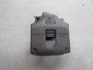 Used Front brake calliper, right Ford Fiesta 5 (JD/JH) 1.4 TDCi Price on request offered by Akkie Stomphorst Autodemontage