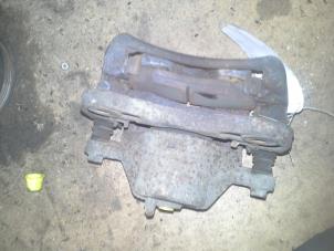 Used Front brake calliper, right Hyundai Coupe 2.0i 16V Price on request offered by Akkie Stomphorst Autodemontage