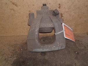 Used Front brake calliper, left Mini Mini Cooper S (R53) 1.6 16V Price on request offered by Akkie Stomphorst Autodemontage