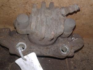 Used Front brake calliper, right Citroen Saxo 1.4i SX,VSX Price on request offered by Akkie Stomphorst Autodemontage