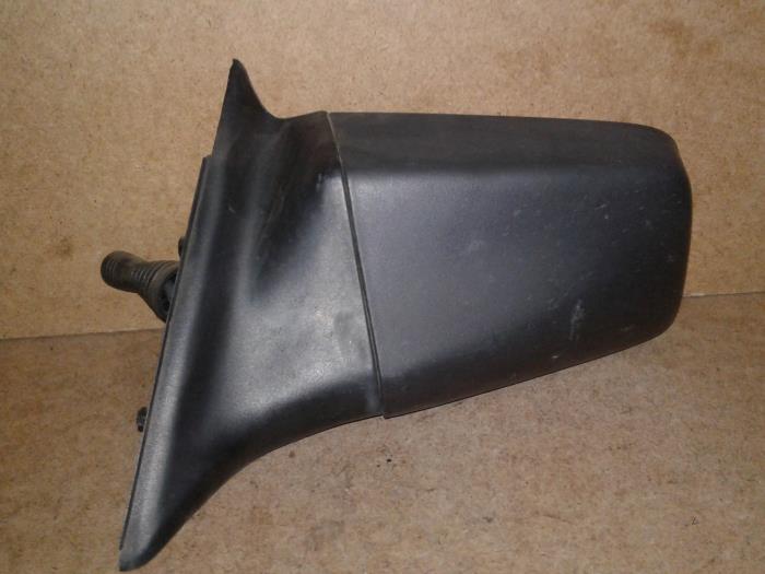 Wing mirror, left from a Opel Astra 1993