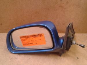 Used Wing mirror, left Mitsubishi Colt (CJ) 1.3 GL,GLX 12V Price on request offered by Akkie Stomphorst Autodemontage